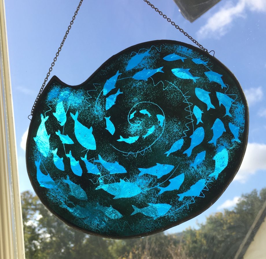Stained Glass Fish spiral on window