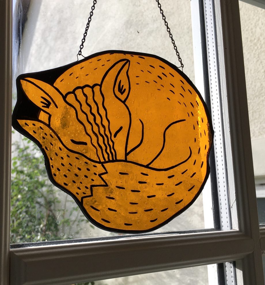 Stained glass sleeping fox sun catcher