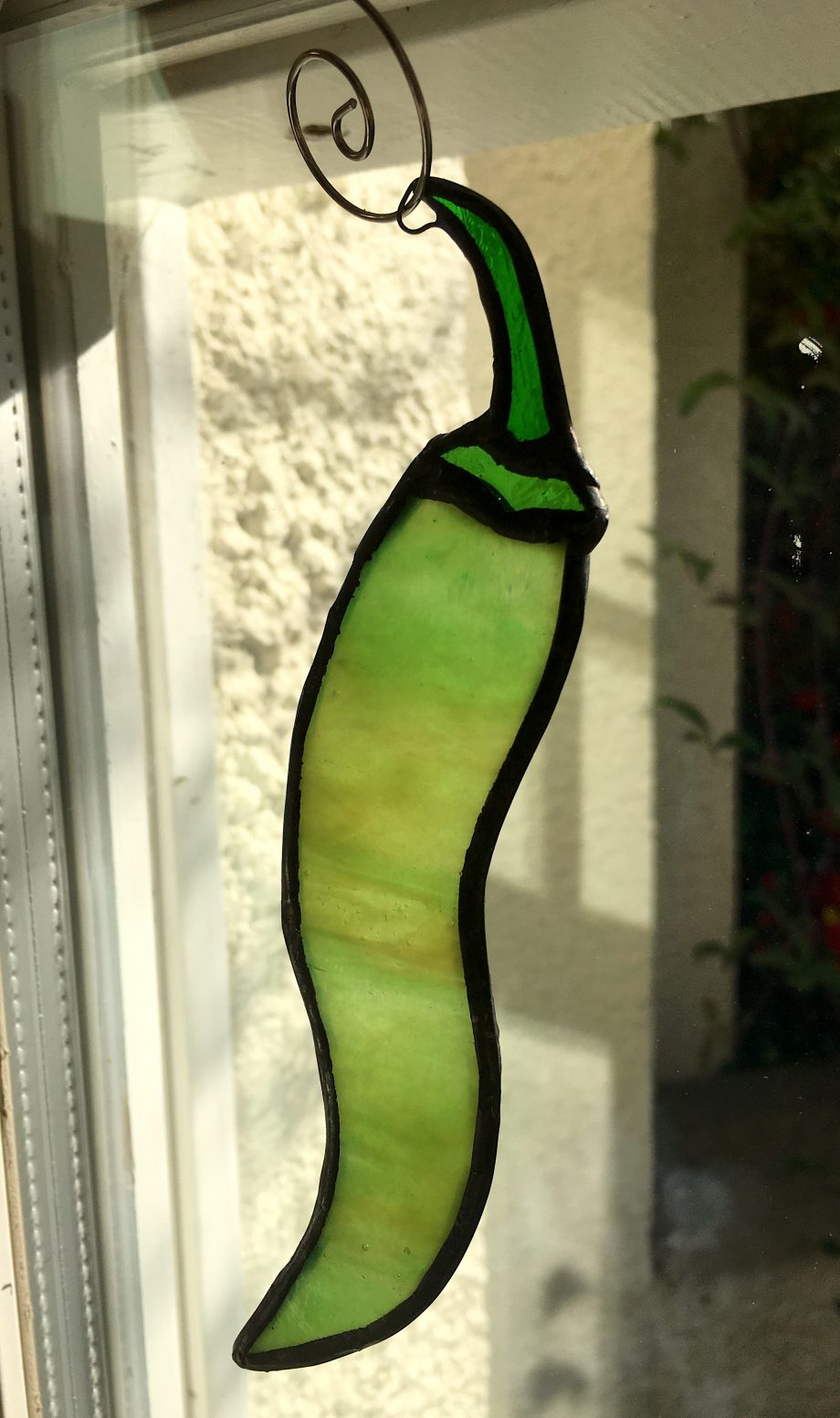 Green stained glass chilli pepper