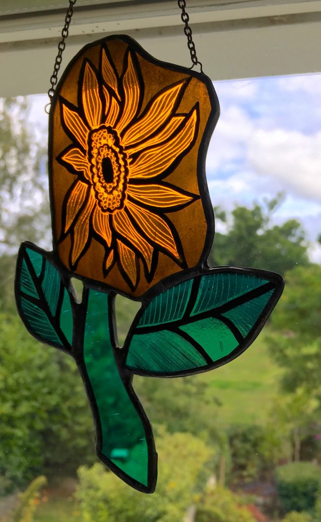 Orange stained glass sunflower suncatchder