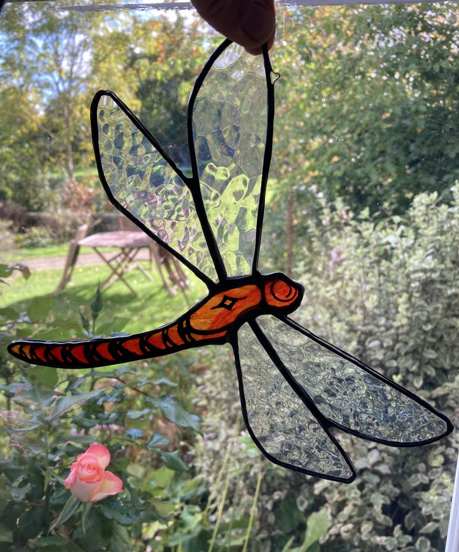Red stained glass dragonfly sun catcher
